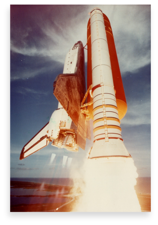 HOME OF ASTRONAUTS, DESTINATION OF PRESIDENTS - Photo of space shuttle launching